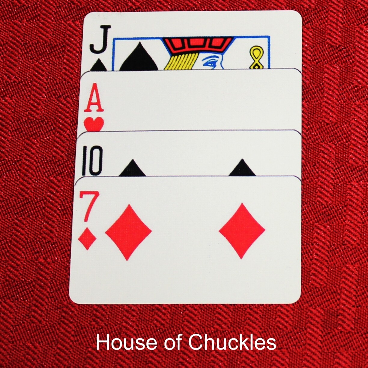 The exclusive Justin Miller Brain Freeze gaff.     Jack of Clubs, AH, 10S, 7D - Overlapping.