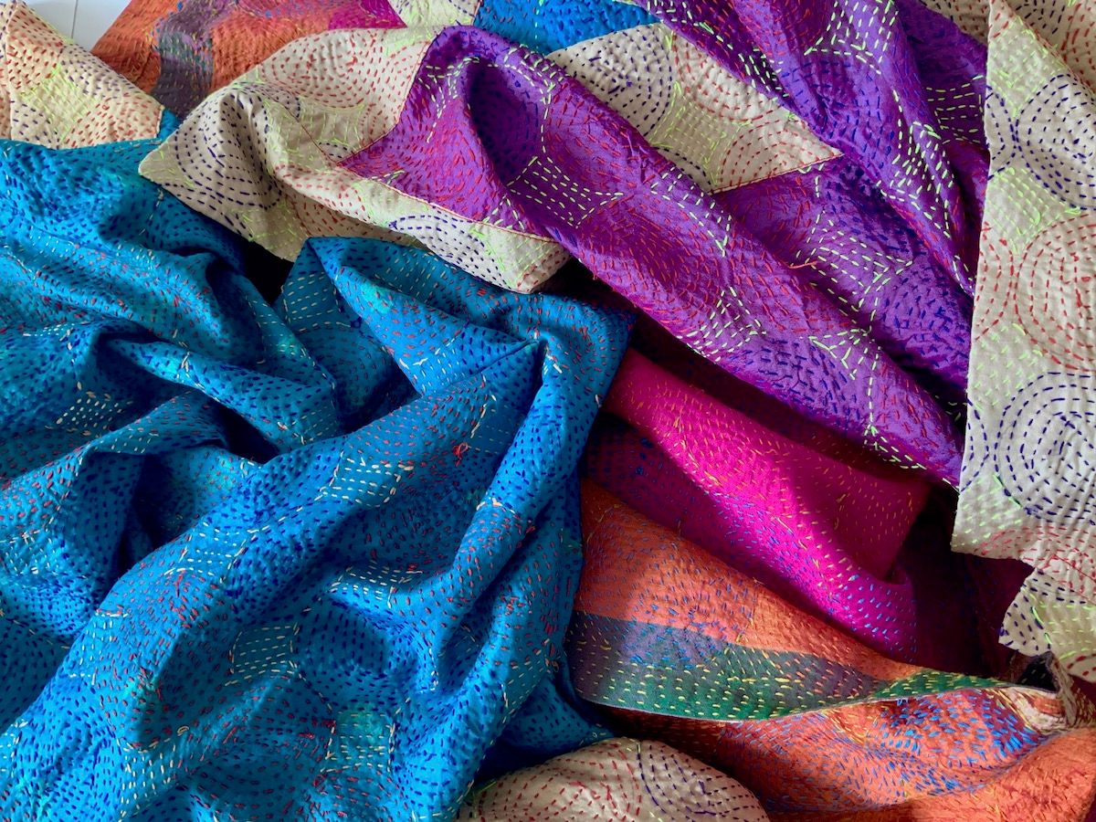 Kantha-stitched silk scarves.