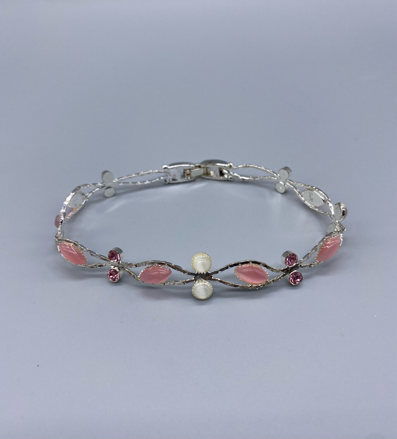 Silver Bangle With Pink Gemstones Silver Bangle With Pink Gemstones
