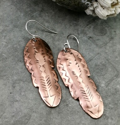 Feather Shaped Copper Earrings with a Feather and Arrow Pattern