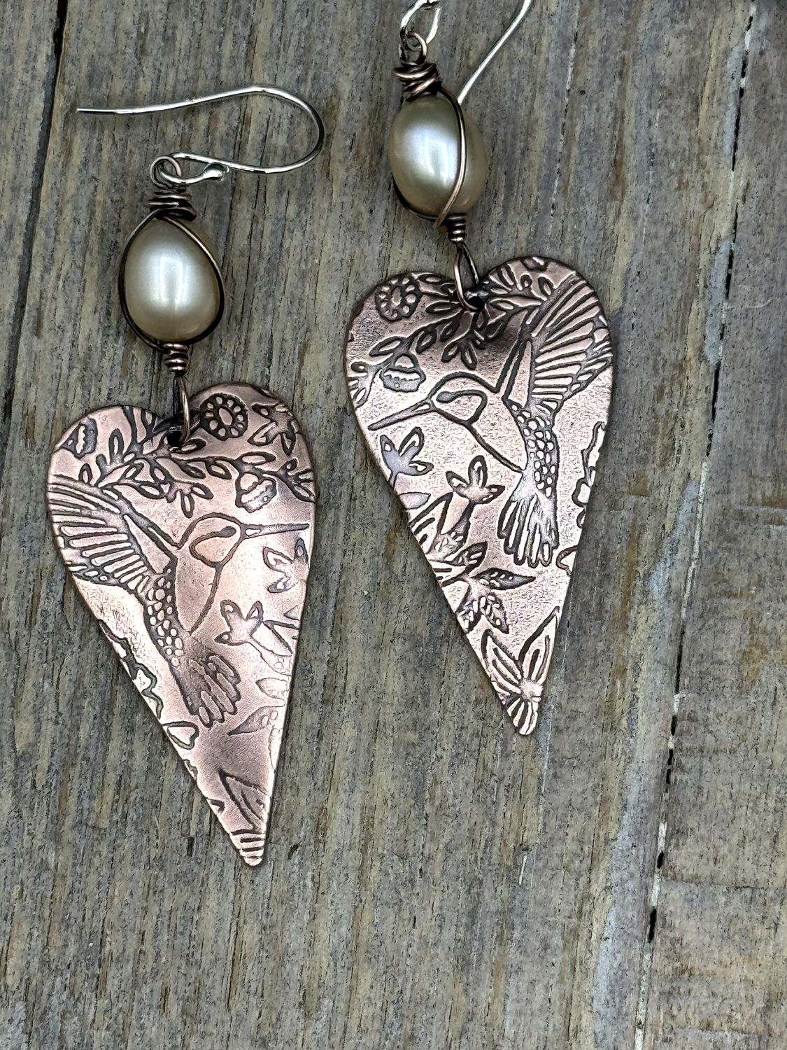Handmade Copper Heart Earrings with Hummingbird Design and Creamy Pearl Accents – Boho Shabby Chic Dangles on Sterling Silver Ear Wires
