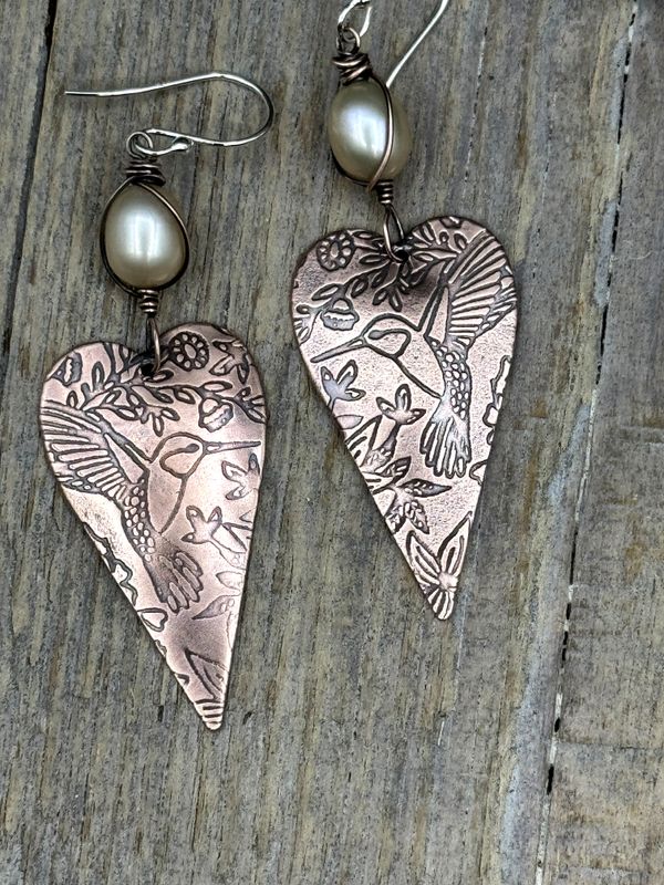 Handmade Copper Heart Earrings with Hummingbird Design and Creamy Pearl Accents – Boho Shabby Chic Dangles on Sterling Silver Ear Wires