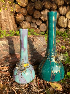 Ancient Creations Ceramics water pipes, bings, and bubblers in 6 different sizes, and styles, with your choice of glass or metal bowls.