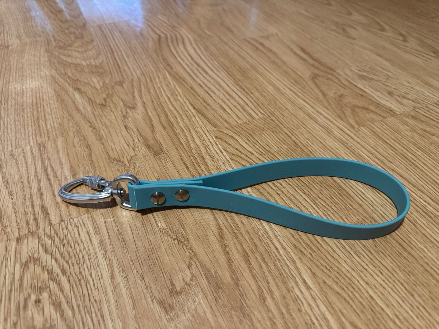 Poignée biothane bleu pétrole