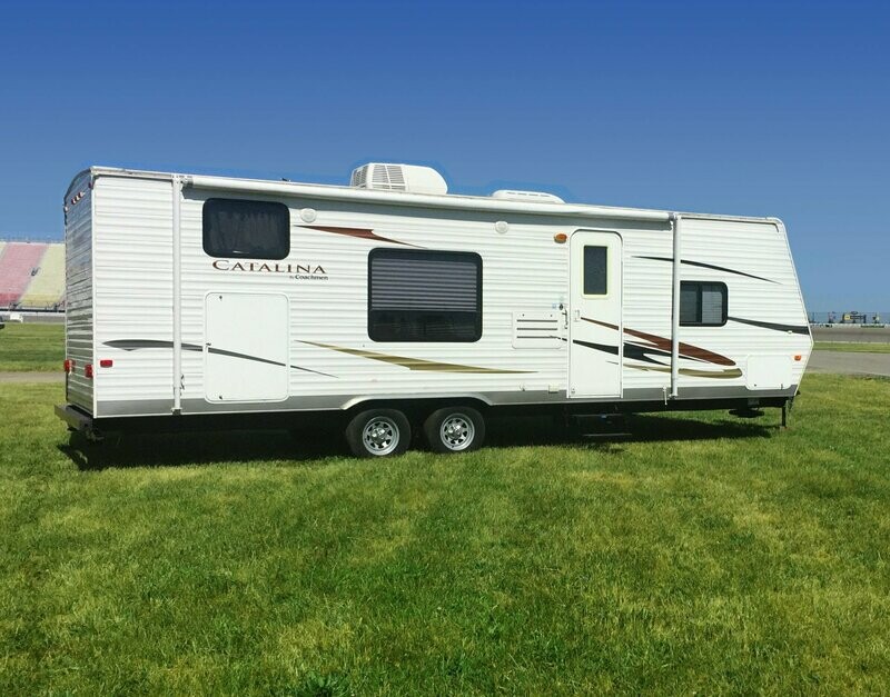 26' RV Rental & Infield Campsite w 4 wristbands & Generator
