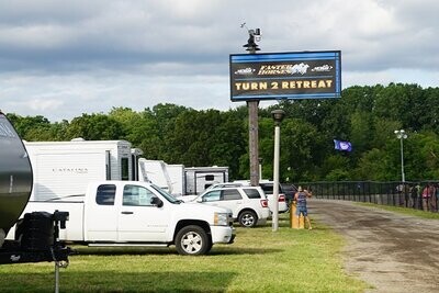 Faster Horses 25' RV Rental and Turn 2 Campsite