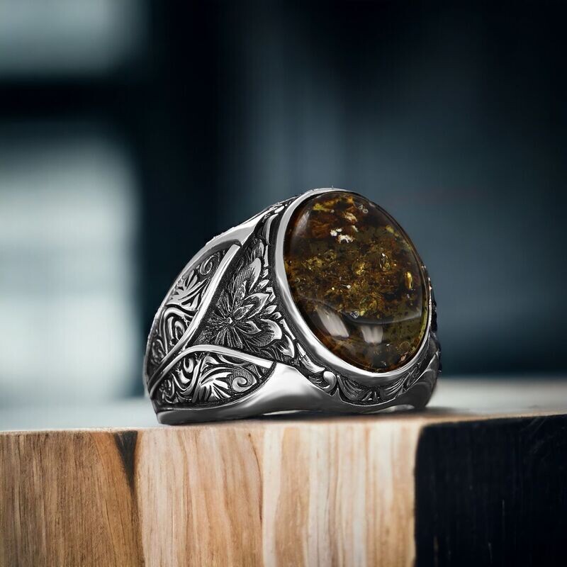 Men's silver ring with fossil teardrop amber Men's silver ring with fossil teardrop amber