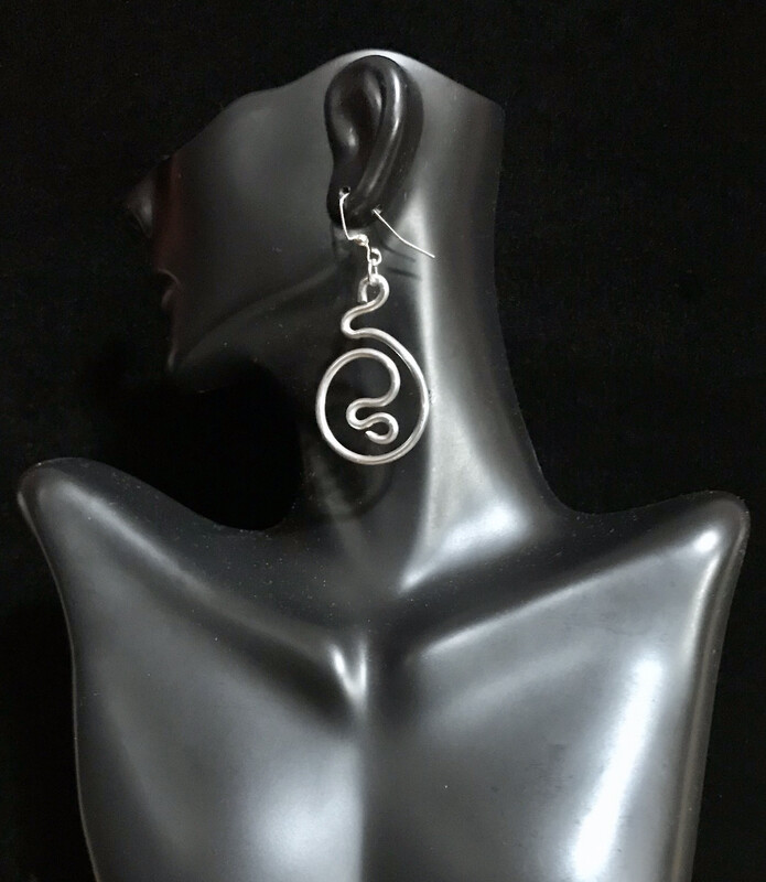 Intricately beautiful and deceivingly lightweight aluminum wire earrings that compliment realistic hairstyles like Sisterlocks, locs, dreadlocks, and afros 
