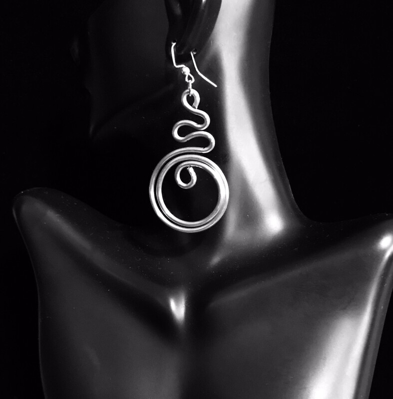 Intricately beautiful and deceivingly lightweight aluminum wire earrings that compliment natural hairstyles like Sisterlocks, locs, dreadlocks, and afros