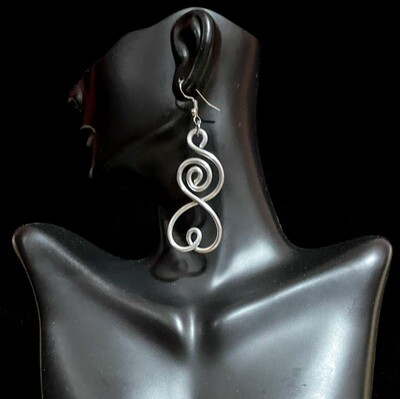 Intricately beautiful and deceivingly lightweight aluminum wire earrings that compliment realistic hairstyles like Sisterlocks, locs, dreadlocks, and afros 