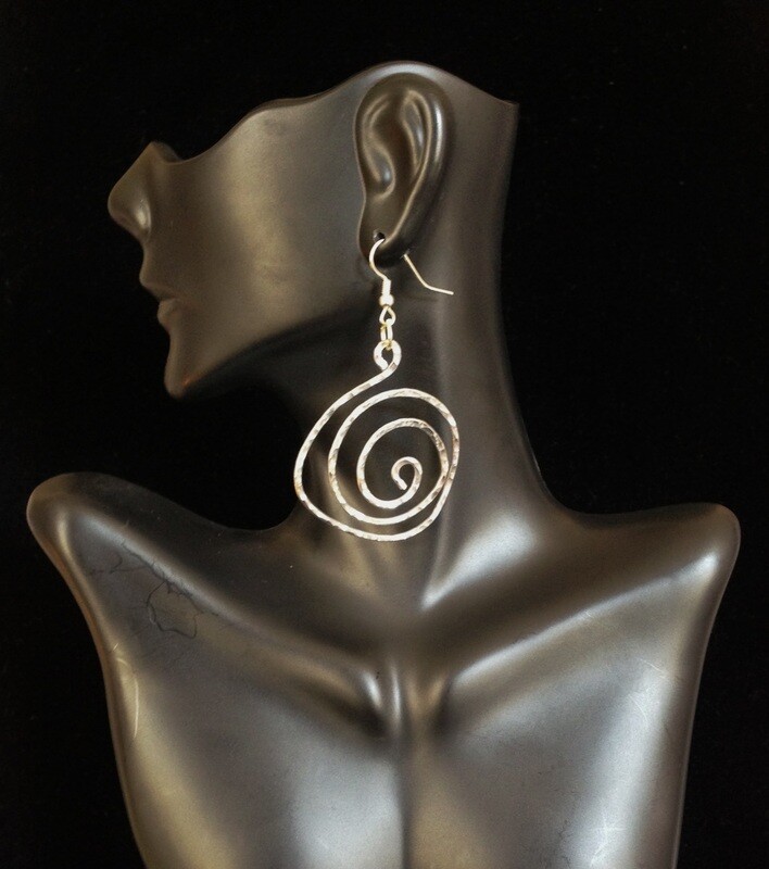 Ear Abstracts are intricately hand-crafted, beautiful, and deceivingly lightweight aluminum/brass/copper wire earrings that complement loc jewelry and natural hairstyles like Sisterlocks, locs, dreadlocks, braids, cornrows, and afros.

