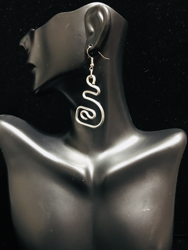 ​Ear Abstracts are intricately hand-crafted, beautiful, and deceivingly lightweight aluminum/brass/copper wire earrings that complement loc jewelry and natural hairstyles like Sisterlocks, locs, dreadlocks, braids, cornrows, and afros.