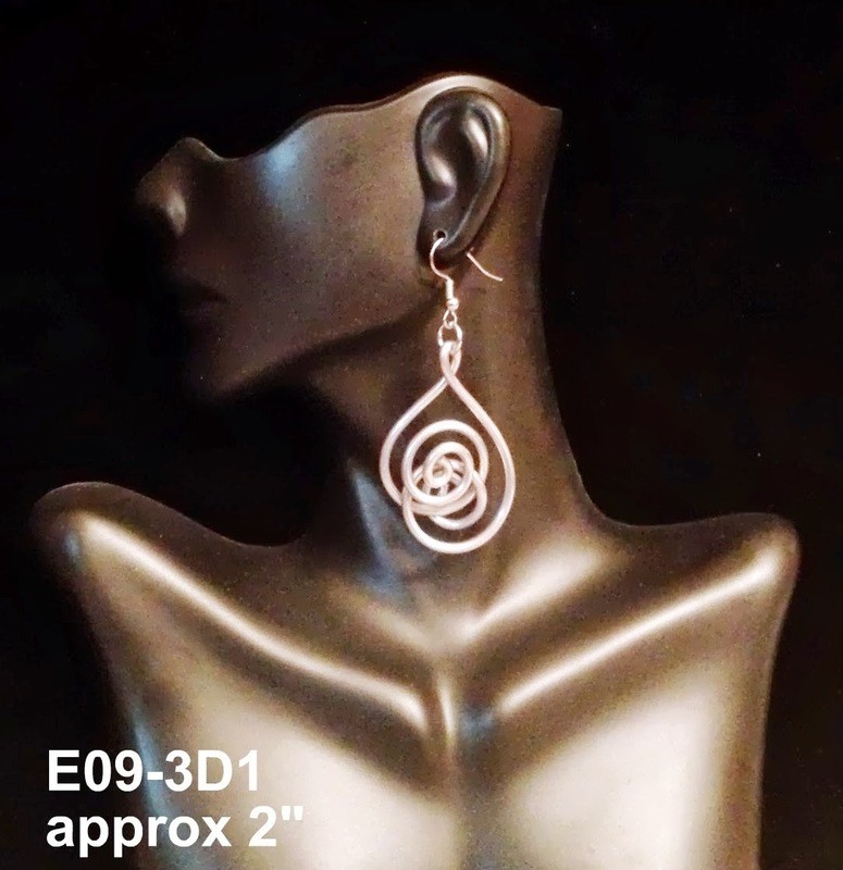 Intricately beautiful and deceivingly lightweight aluminum wire earrings that compliment natural hairstyles like Sisterlocks, locs, dreadlocks, and afros 
