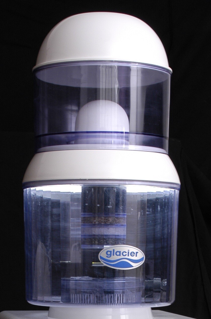Hot &amp; Cold Water Dispenser plus PVC Filtration System On-Top-Of-Dispenser.