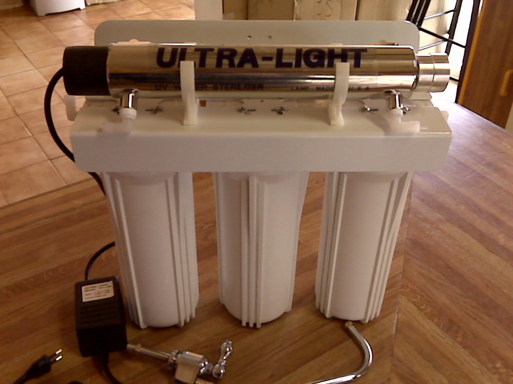 Triple Under Counter Water Purifier With UV Sterilizer System &amp; Filter cartridges.