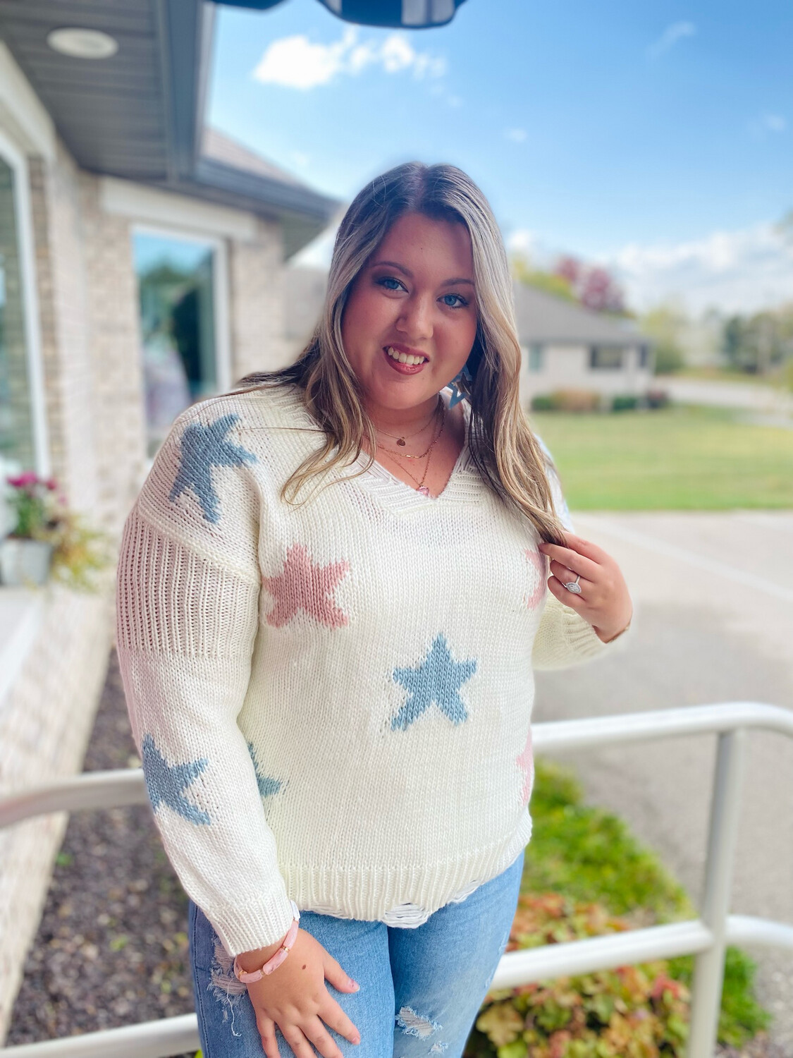 V-Neck Frayed Star Sweater
