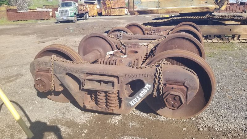 Recently in service rail car wheels and trucks
