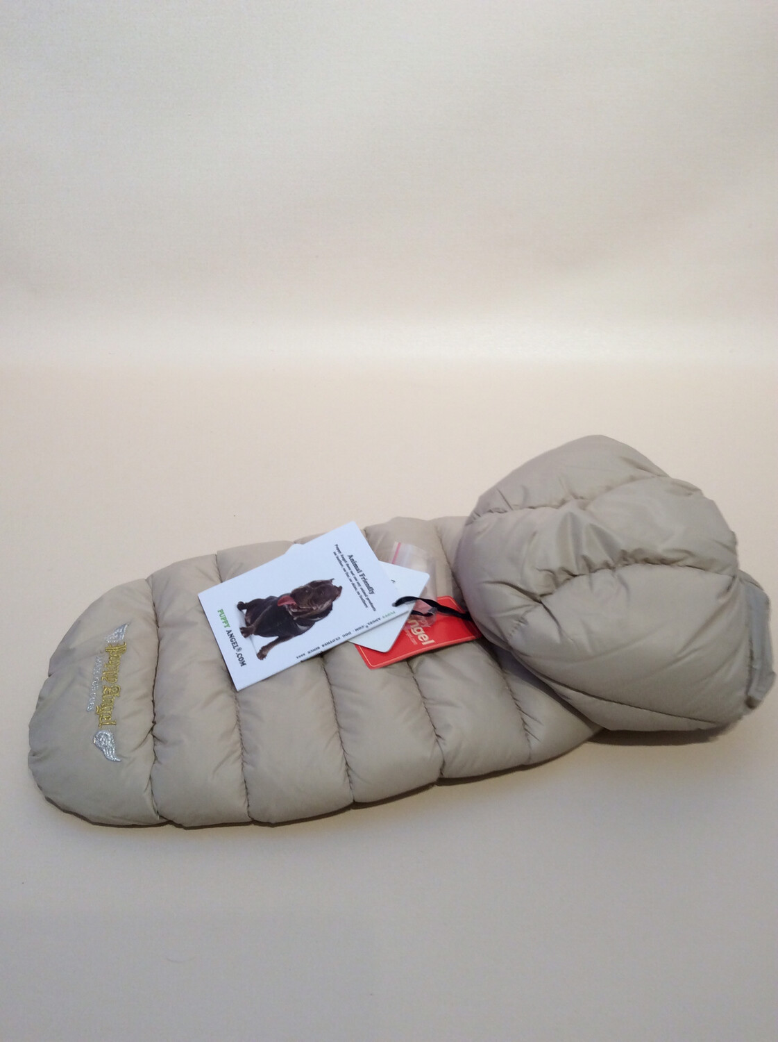 Padding with detachable hood beige Padding with detachable hood beige