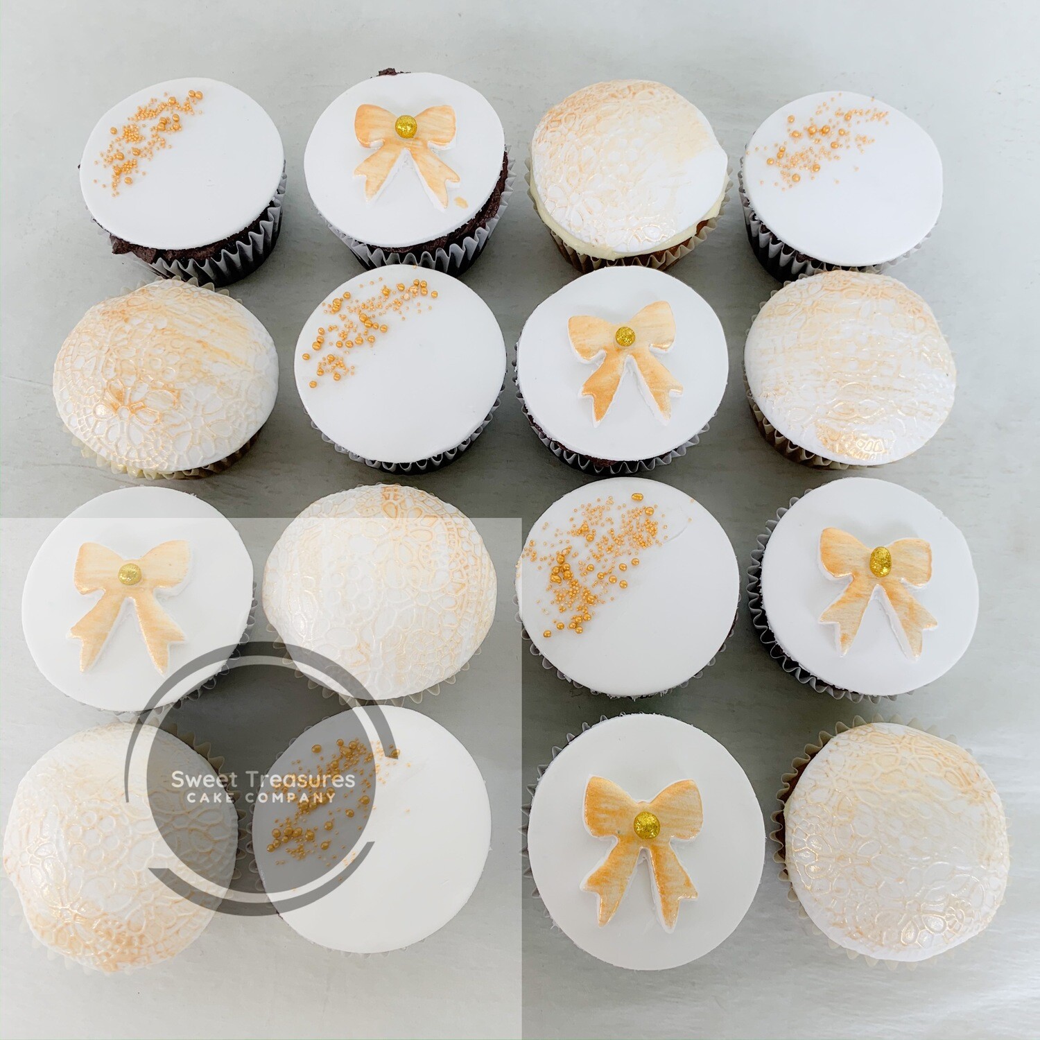 White and gold Embossed Cupcakes