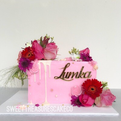 Pink buttercream chocolate drip Single tier cake