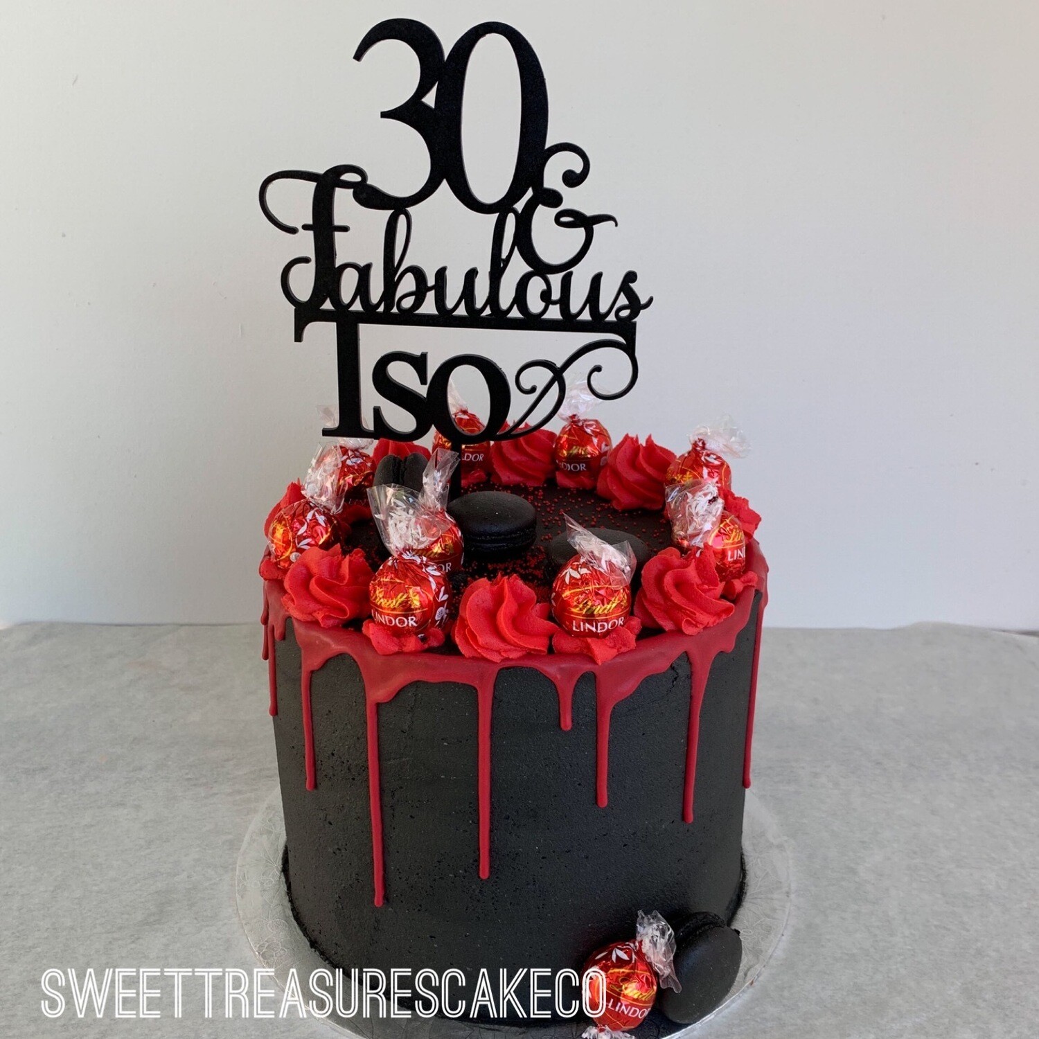 Black and Red Drip Single tier Cake