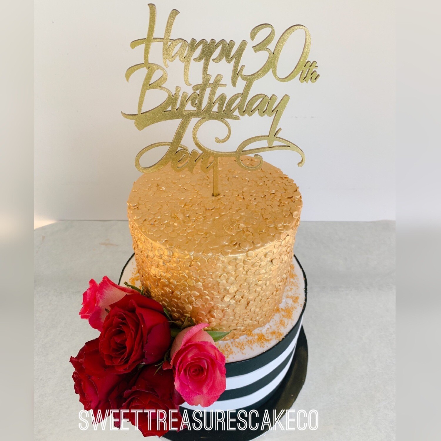 Black, white and gold 2 tier cake