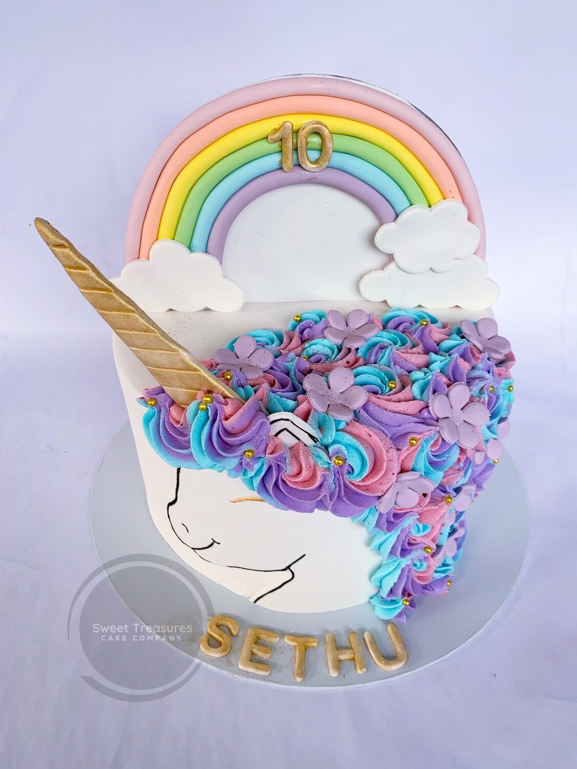 Rainbow topped unicorn Single tier cake