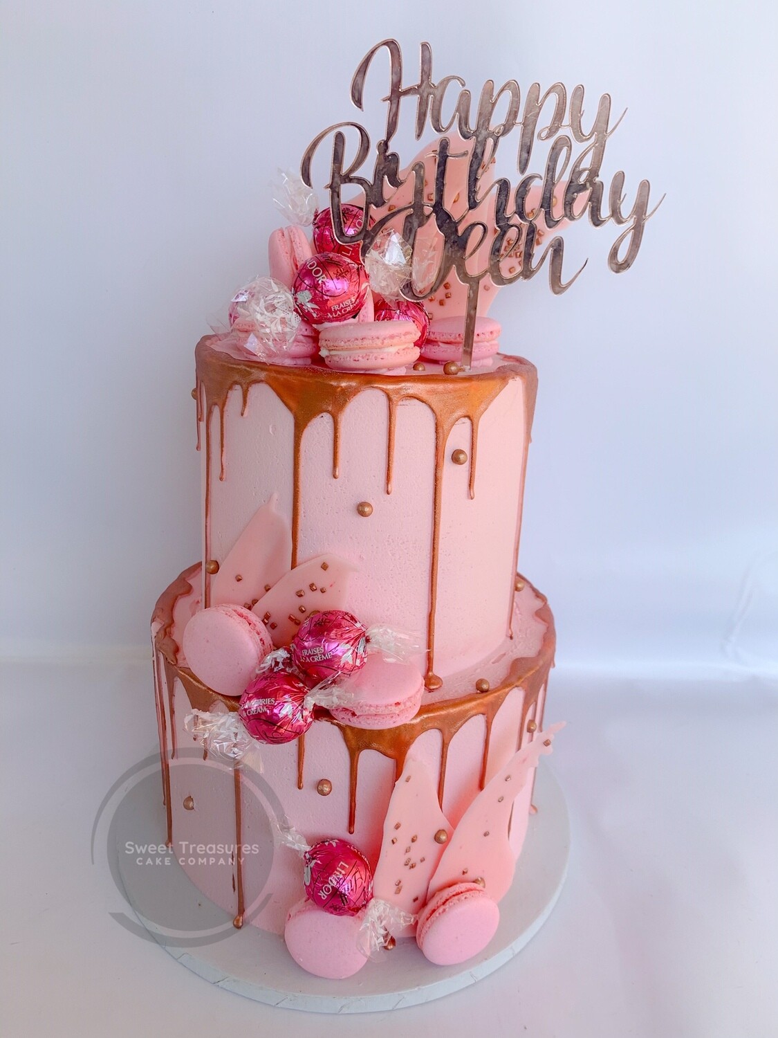Pink buttercream with rose gold drip 2 tier cake