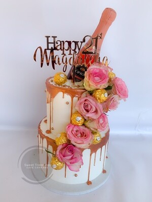 Champagne topped buttercream choc drip 2 tier cake