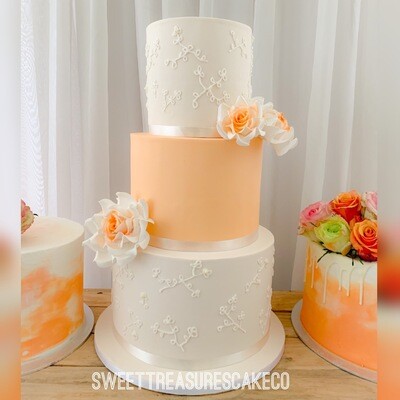 3 tier Cream and Orange Wedding Cake quotation