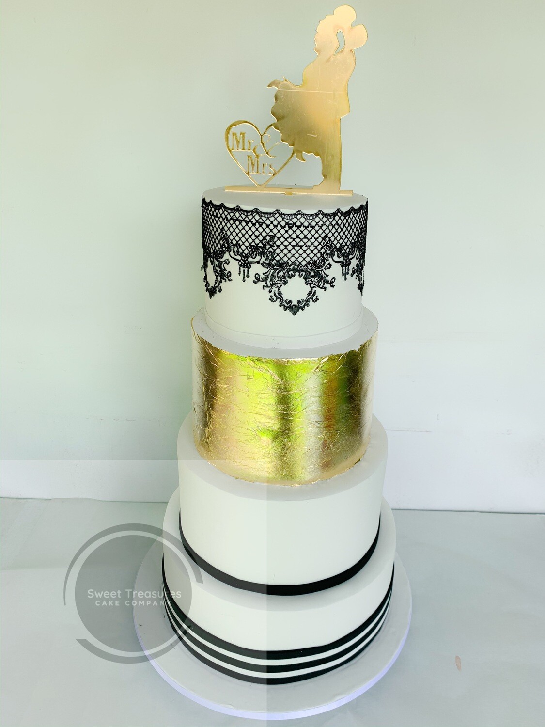 4 tier Black, White and Gold Wedding Cake quotation