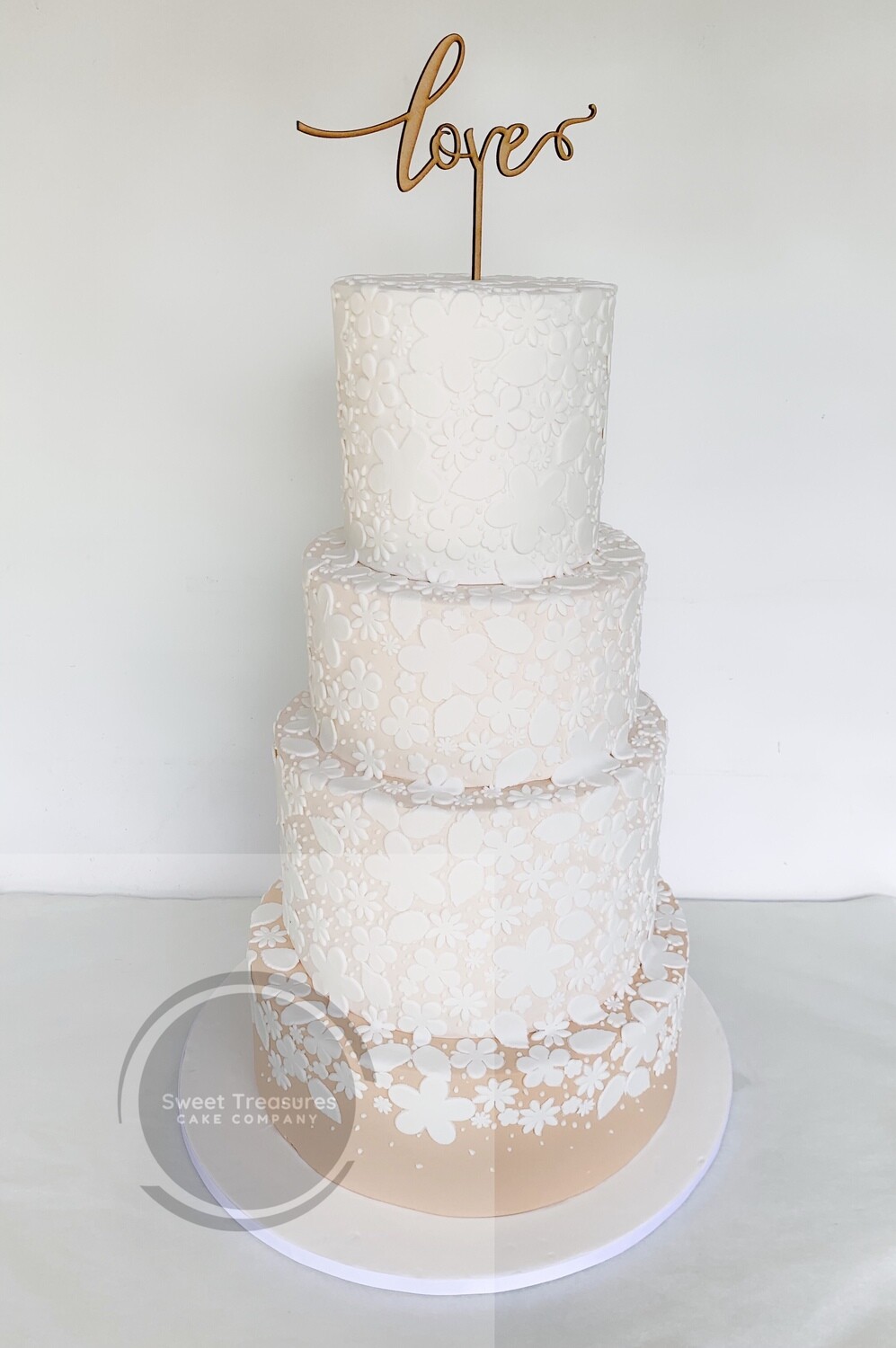 4 tier Cream and white flower lace Wedding Cake quotation