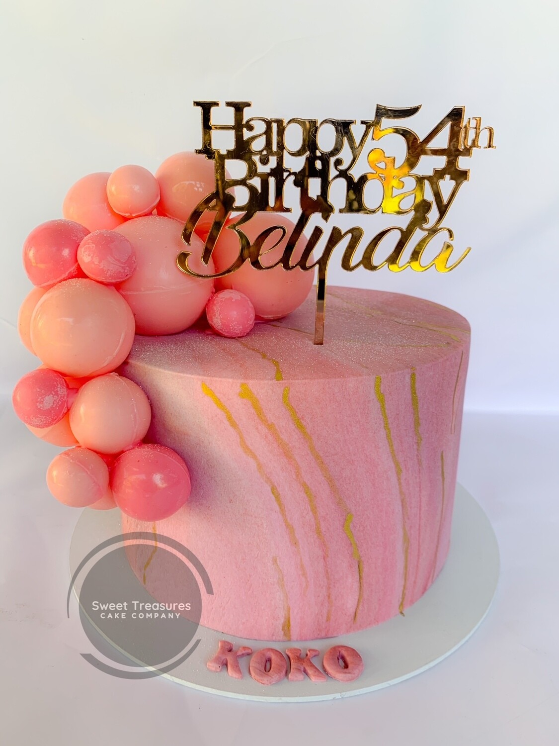 Fondant marble cake with chocolate Spheres Single tier cake