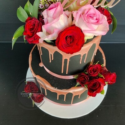 Fondant covered choc drip 2 tier cake