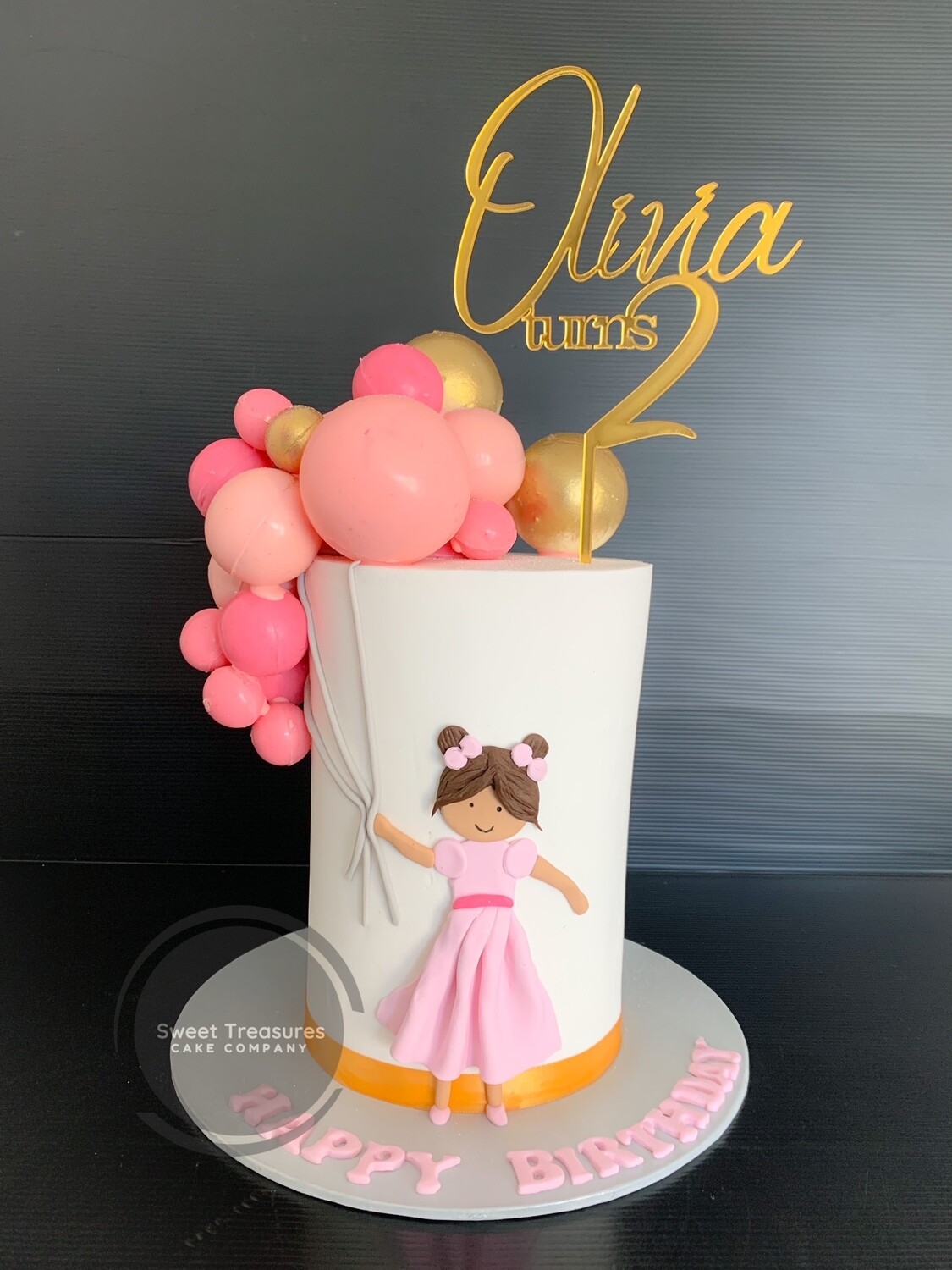 Baby doll sphere balloons Single tier cake