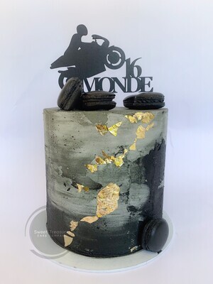 Single tier black and grey marbled cake