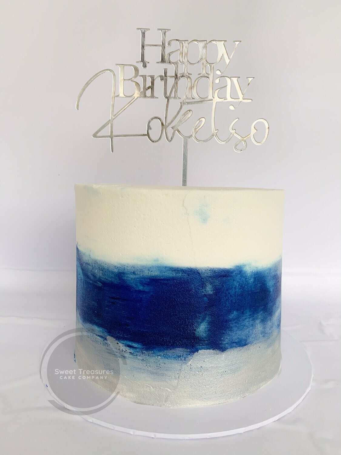 Blue white and silver Single tier cake