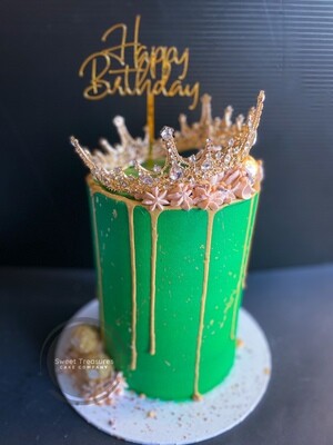 Crown topped gold drip single tier cake