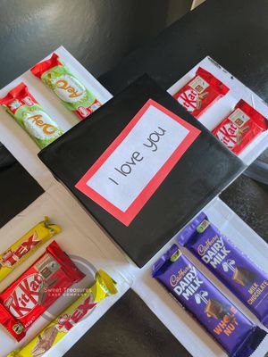 "I Love You This Much" Explosion Box displaying custom doodles and heartfelt notes