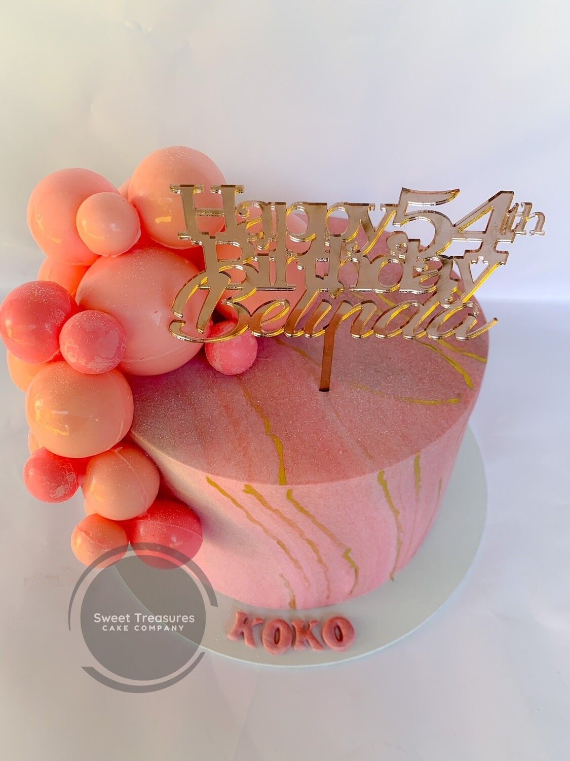 Marbled Fondant with Spheres Single tier cake