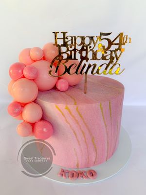 Marbled Fondant with Spheres Single tier cake