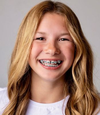 Grace T.