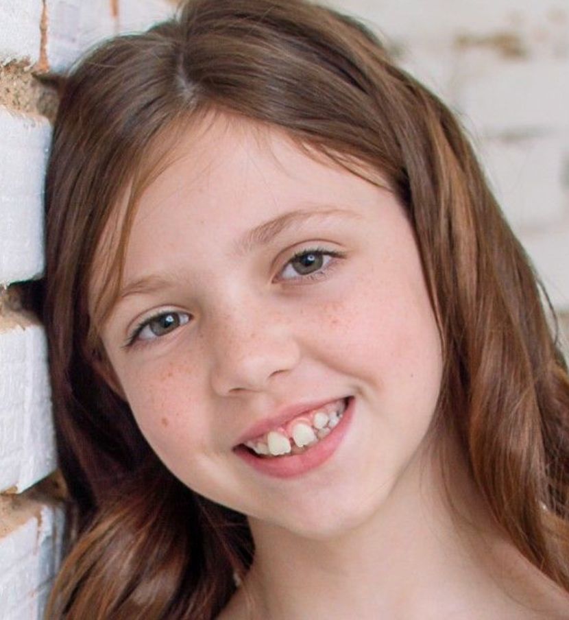 Maci L.