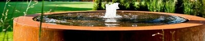 Les Tables d'eau fontaine ou bassin acier corten