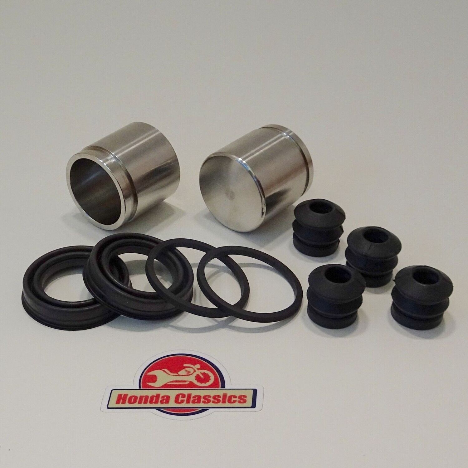 Front Brake Caliper Pistons & Seals Set - KIT059