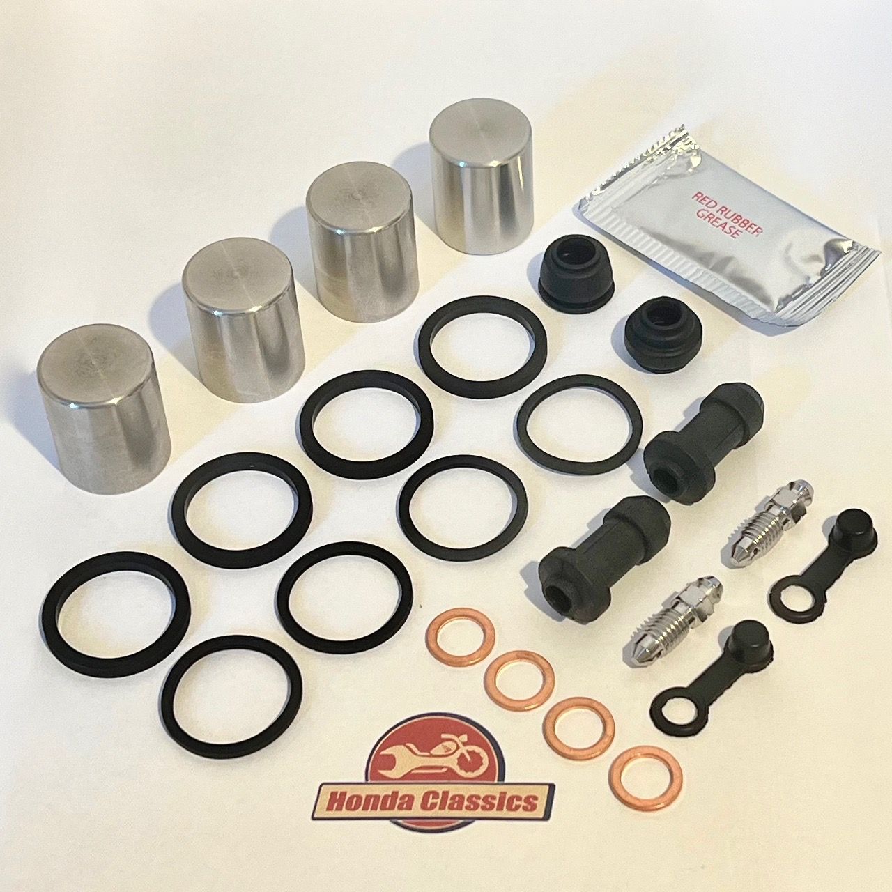 Front Brake Caliper Pistons x 4 & Repair Kit - KIT214