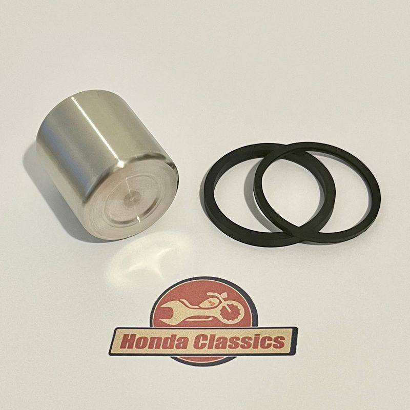 Front Brake Caliper Piston Stainless Steel & Seals Set. 45107-ML7-692P