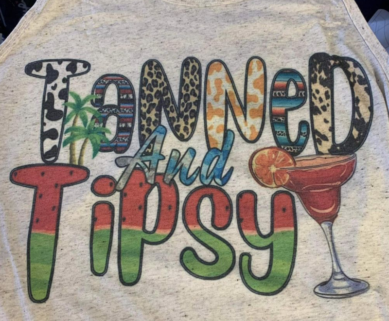 Tanned And Tipsy