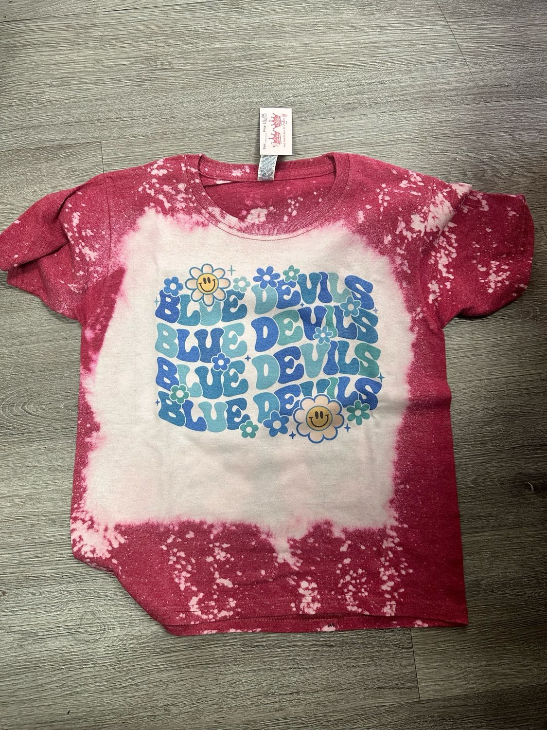 Blue devil stacked w flower smiley bleached