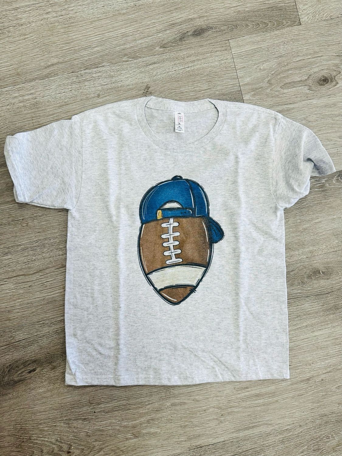 Boy football w cap